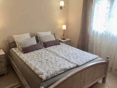Vacation house Granada: bed in the ground floor with air condition